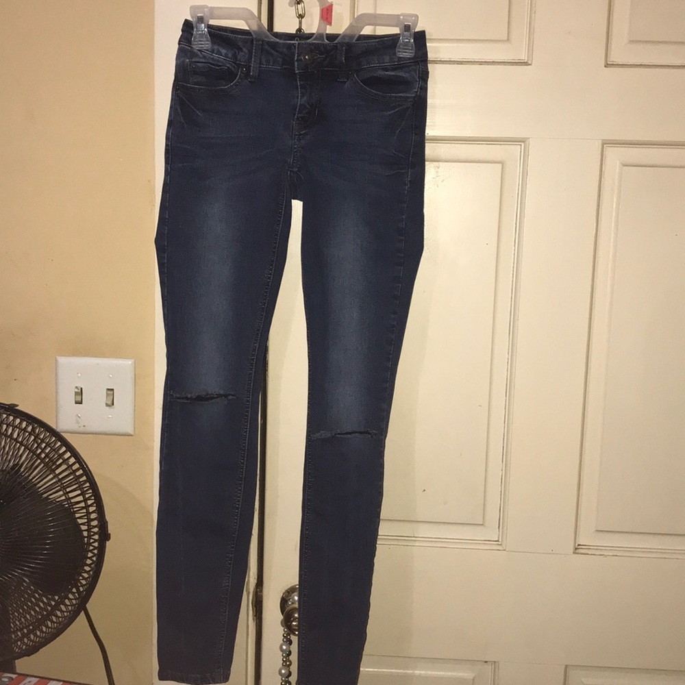 Ripped blue jeans